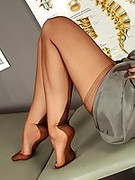 Hot mature secretary Brown FF Stockings and heels flashing her sexy nyloned feet
