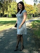 Dark blue stilettos go well with this babes blue dress and dark stockings.