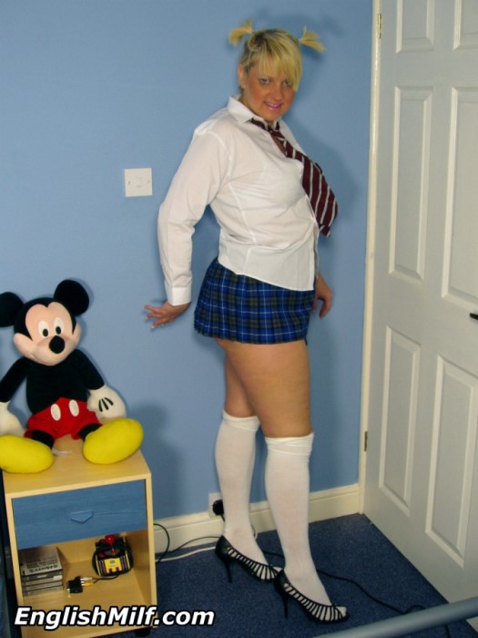MILF Daniella in pigtailes and school uniform