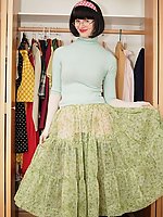 Mature in ff nylons, tight sweater, skirt, and a pink girdle